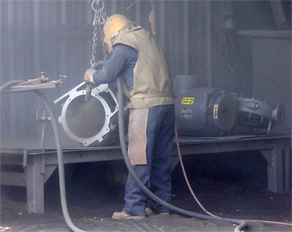 Nash Pump being Sandblasted
